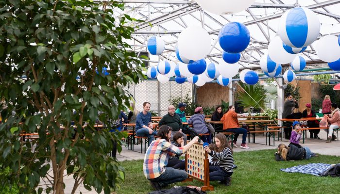 Folks and families hang in the Horticulture Center.