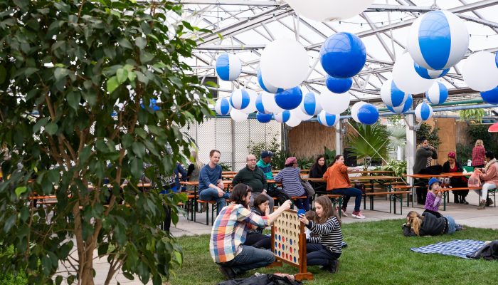 Folks and families hang in the Horticulture Center.