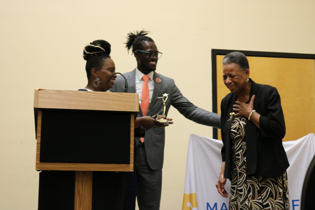 Reverend Phyllis Harris, receiving the Alain Locke School champion award with Pam Evans, Locke Community School Coordinator and Maxwell Akuamoah-Boateng, Director of Operation, Community Schools