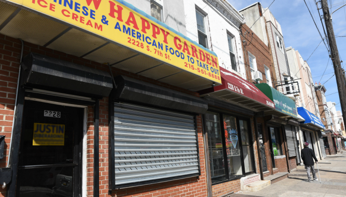 A Chinese restaurant and other store fronts in the Kensington neighborhood of Philadelphia