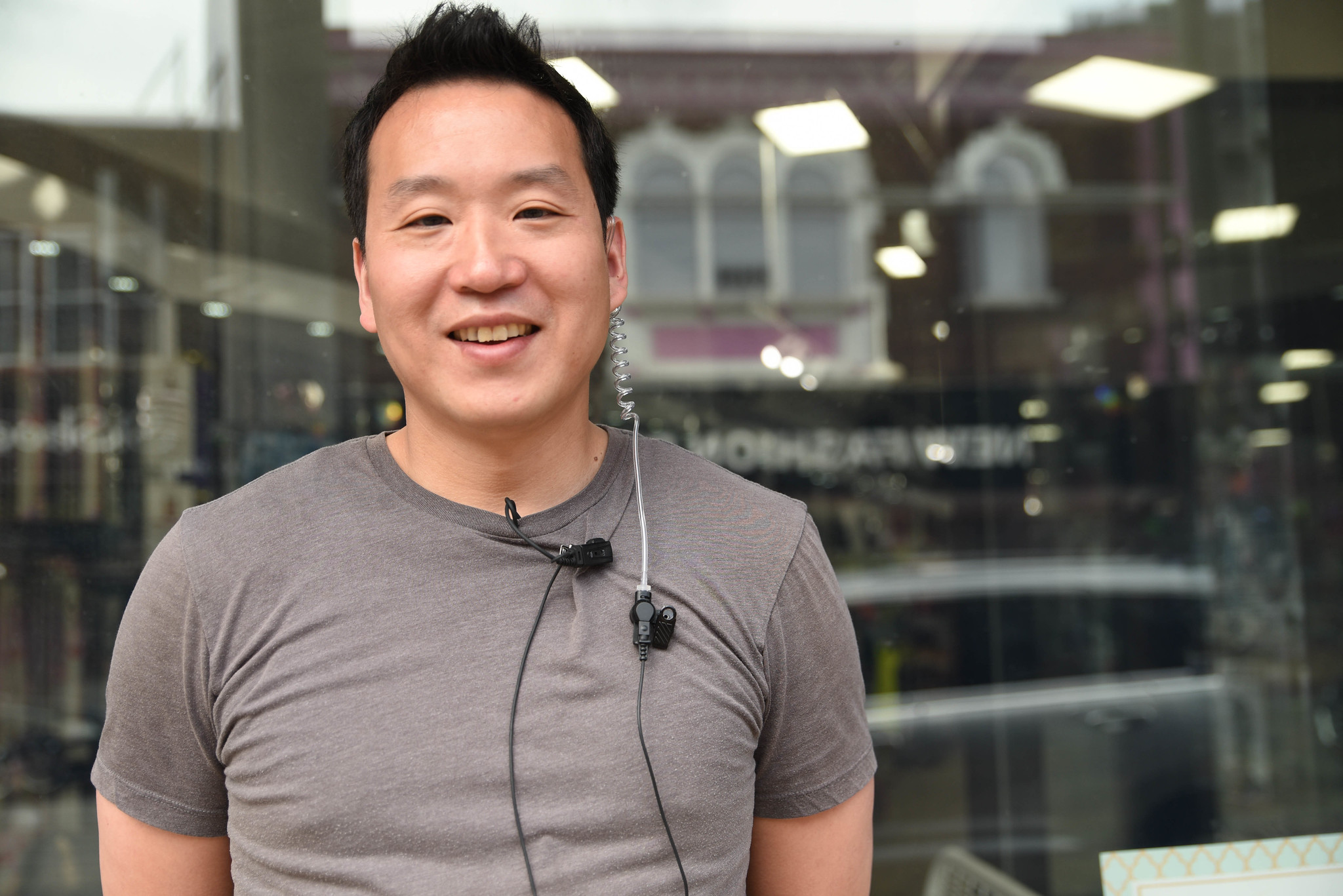 Tops Beauty owner, Paul Lim, stands in front of his business.