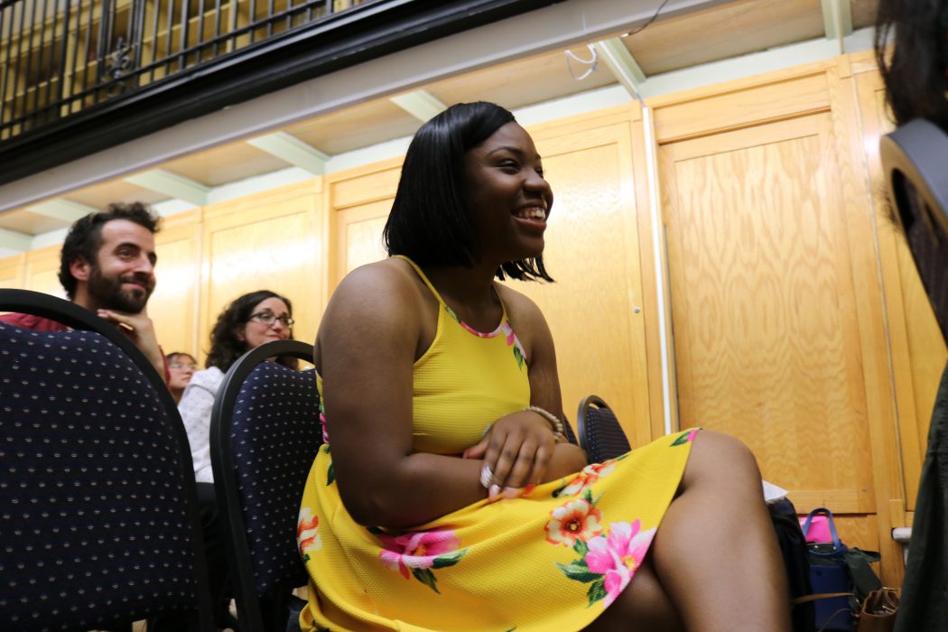 Lanayjah smiling as her name is read for a Community Schools Champion award