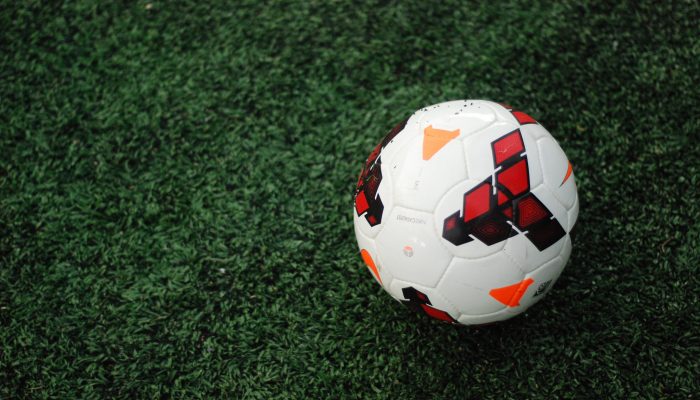 soccer ball on a green pitch