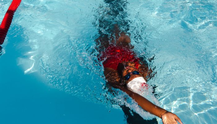 A woman swimming in a pool