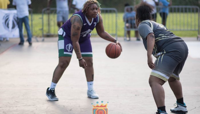 Women playing basketball.