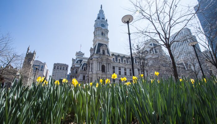 Philadelphia City Hall with flowers in the foreground.
