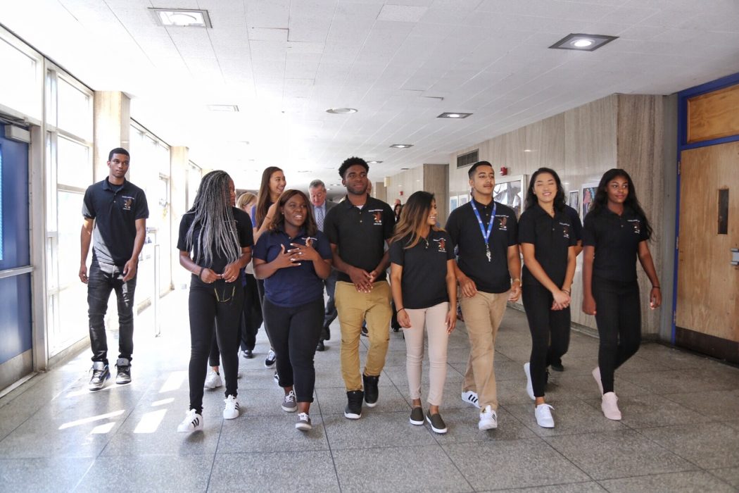 Community Schools students at George Washington High School walk together through a hallway with Mayor Jim Kenney and Superintendent Dr. Hite.