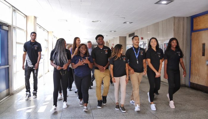 Community Schools students at George Washington High School walk together through a hallway with Mayor Jim Kenney and Superintendent Dr. Hite.