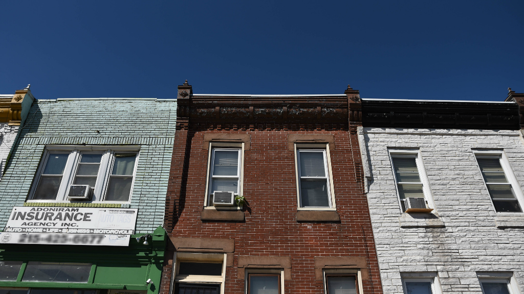 Three rowhouses in the Kensington neighborhood of Philadelphia