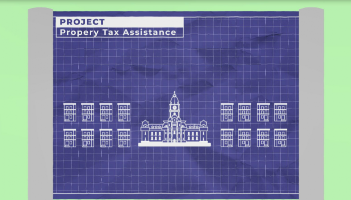 A drawing of a blueprint with Philadelphia City Hall in the middle, with rowhouses around it.