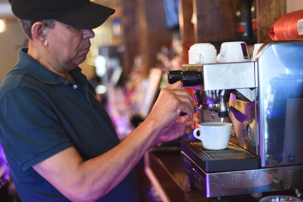 Man making coffee.