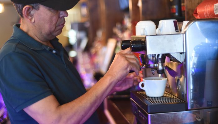 Man making coffee.