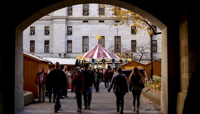 People gather in City Hall Courtyard