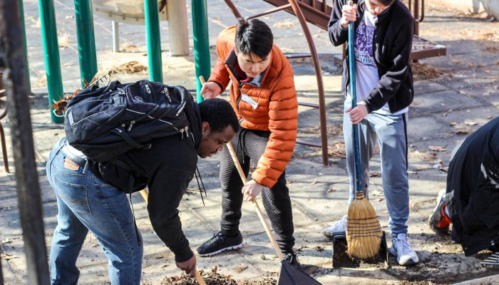 Volunteers help clean up a park on MLK Day of Service.