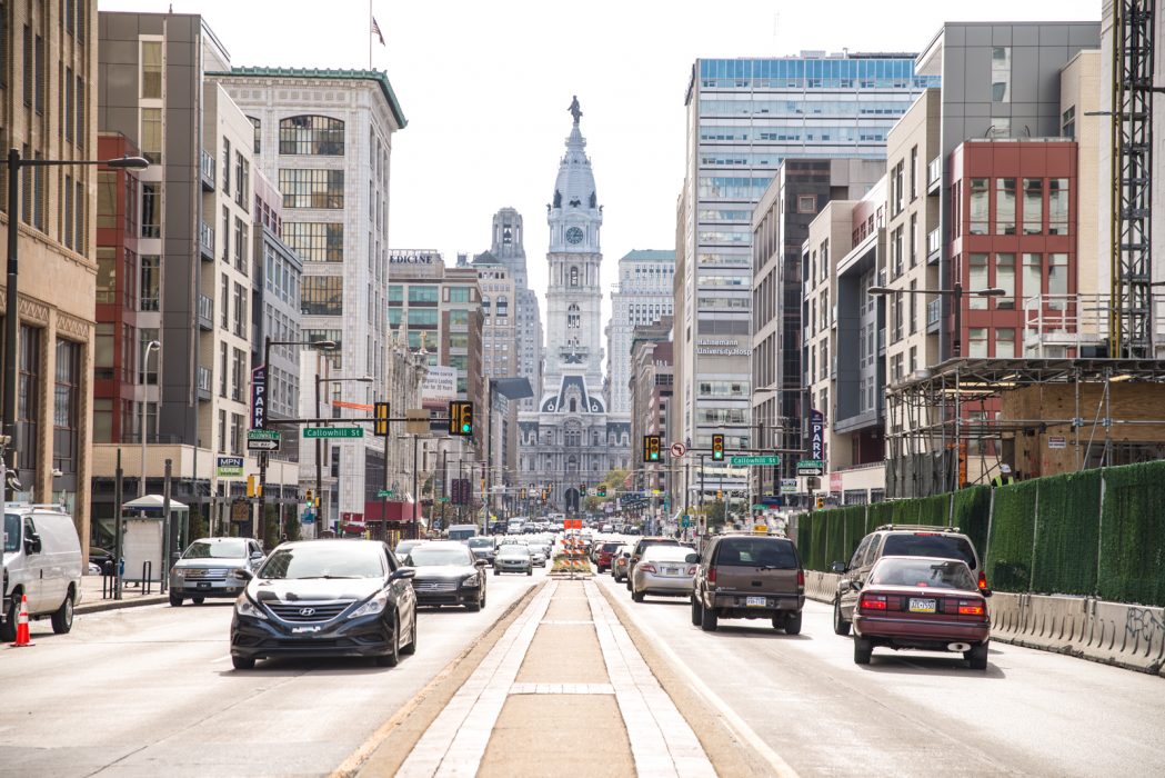 City Hall view from the street, traffic and cars