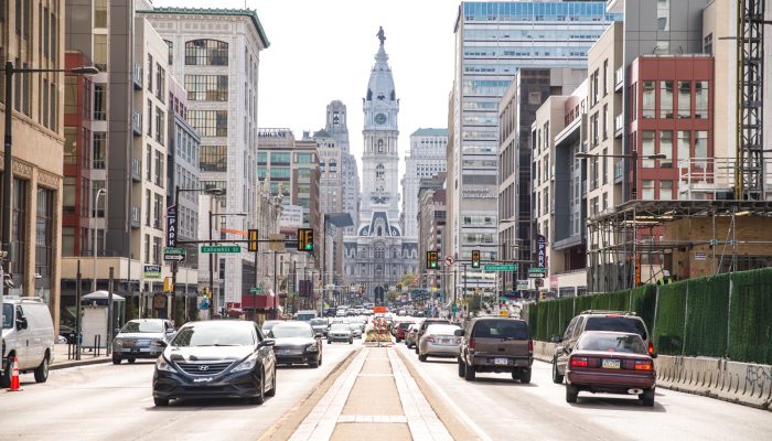 City Hall view from the street, traffic and cars