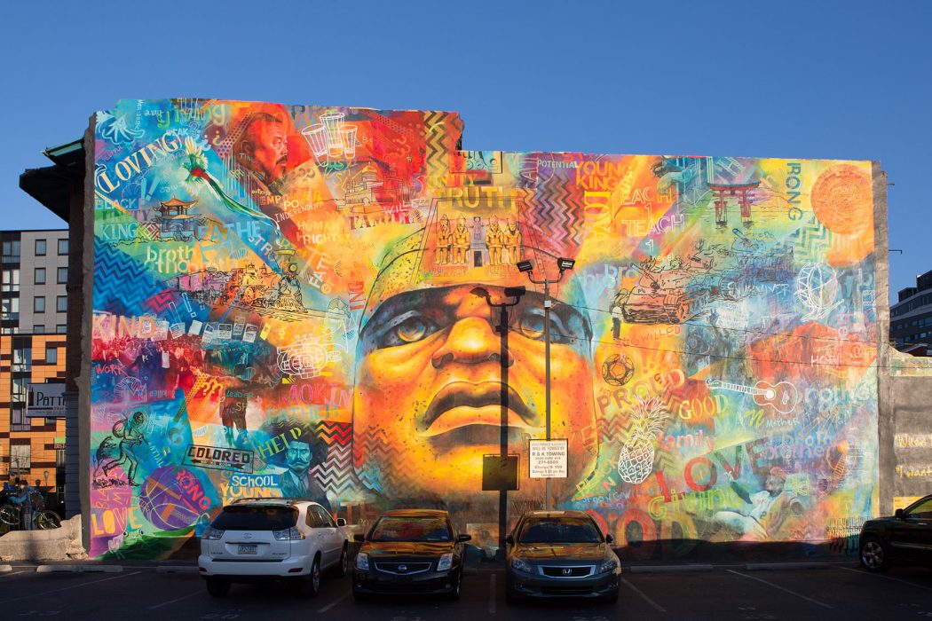 a mural of a colorful face
