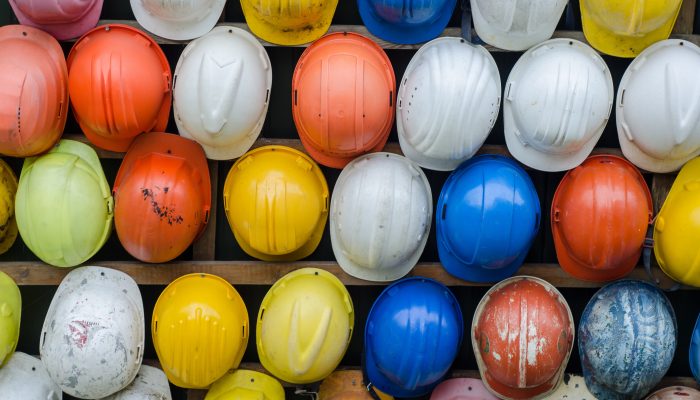 Colorful construction helmets representing construction work