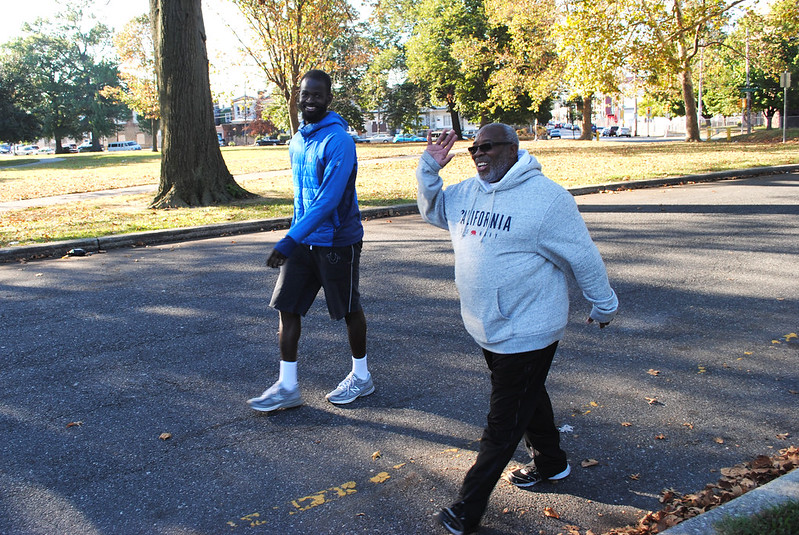 Men walking in a park