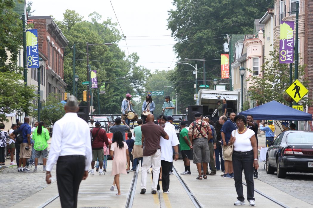 People on a city street for a festival