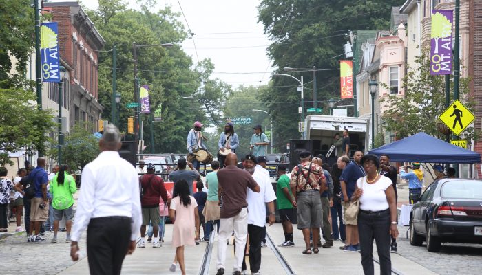 People on a city street for a festival