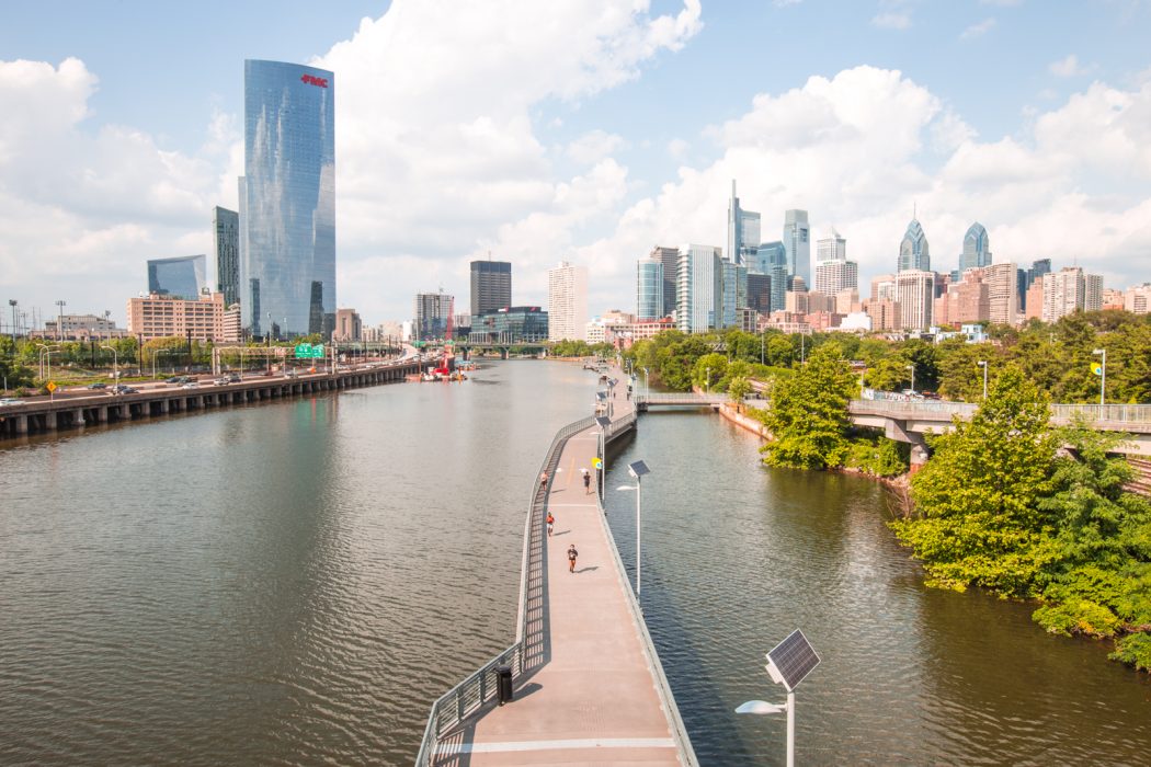 The philadelphia skyline from the south street bridge on a sunny day