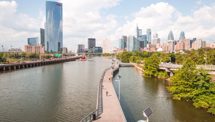 The philadelphia skyline from the south street bridge on a sunny day