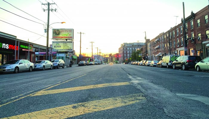 cars parked alongside a street