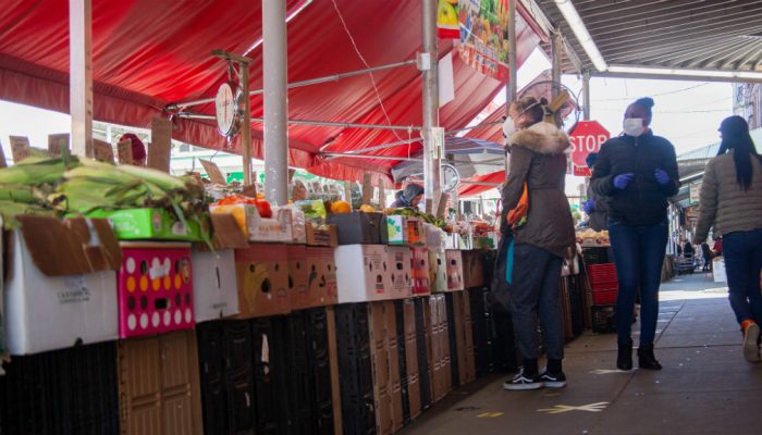 shoppers in food market