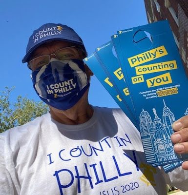 Philly Counts volunteer showing doorhangers