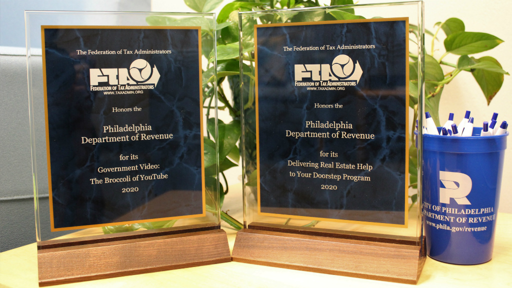 Two award plaques from the Federation of Tax Administrators, given to the Philadelphia Department of Revenue
