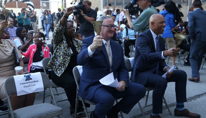 Dr. Hite and Mayor Kenney ringing bells at a school opening celebration in a previous year