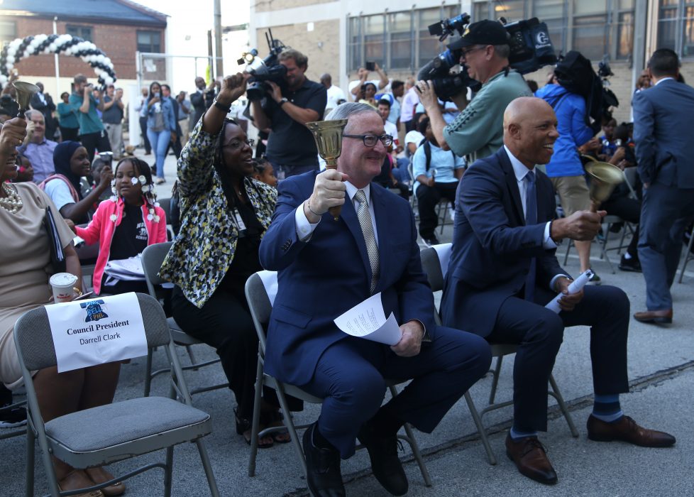 Dr. Hite and Mayor Kenney ringing bells at a school opening celebration in a previous year