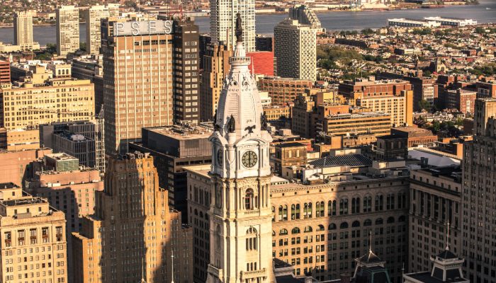 City Hall against a backdrop of Philadelphia buildings