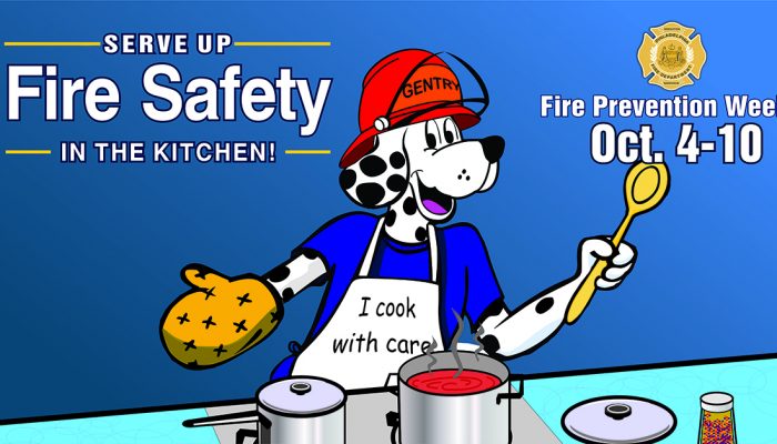 Cartoon Dalmatian in firefighter helmet cooking wearing apron that says "I cook with care."