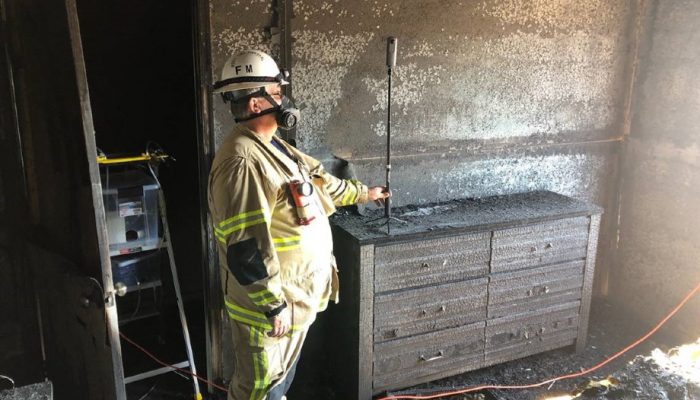 A firefighter using a 360-degree camera.