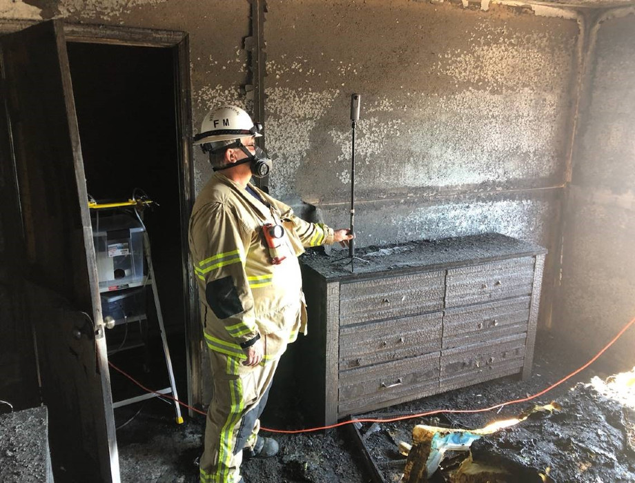 A firefighter using a 360-degree camera.