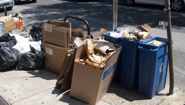 trash and recyclables on City street