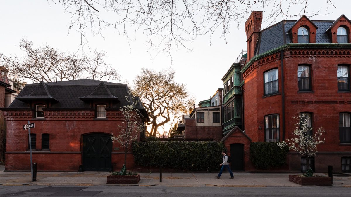 man walking in residential neighborhood in Philadelphia