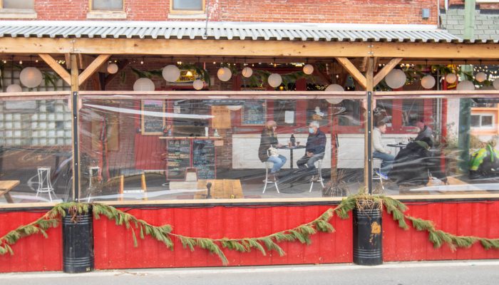 two people dining outside 