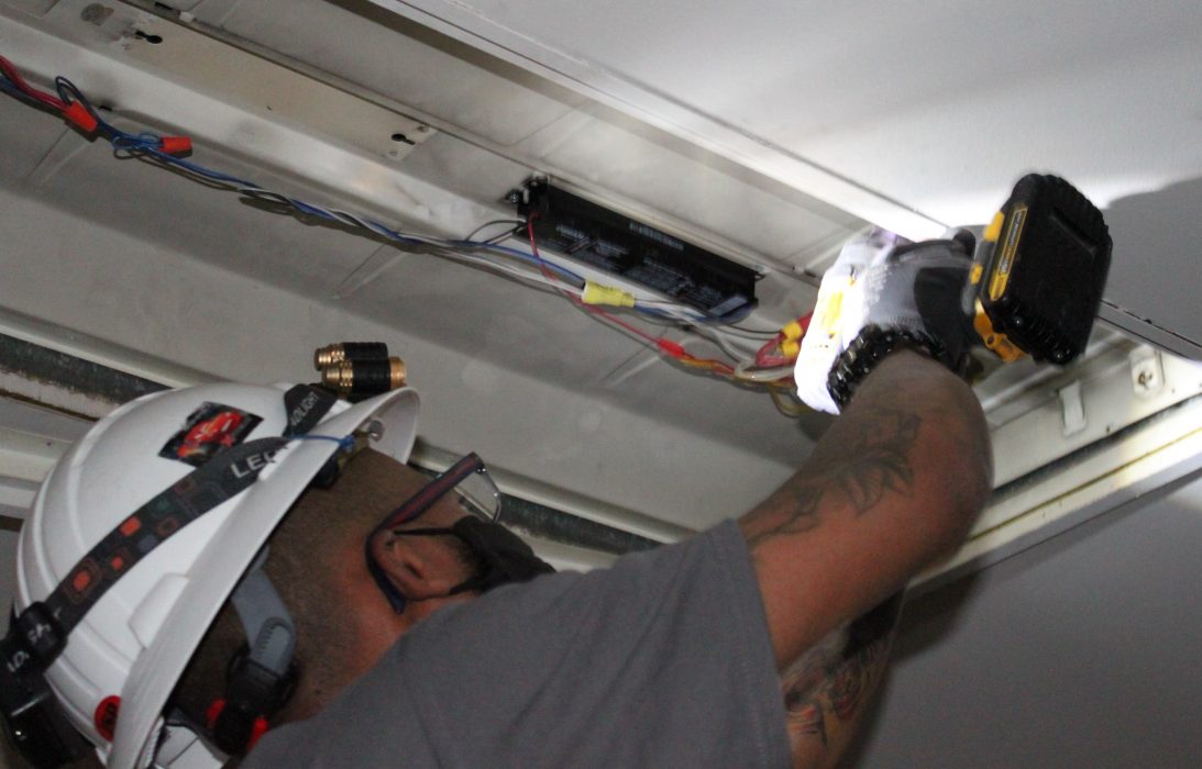 Ricky Pearson of Centrica installs lighting at the African American Museum of Philadelphia