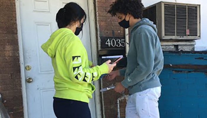 Pictured are two of our High School student volunteers canvassing