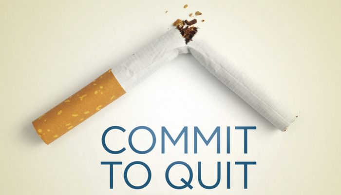 A broken cigarette with the words commit to quit