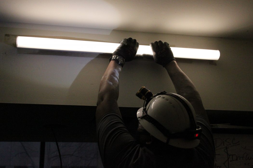 Andre Gale of Centrica installing LED lighting at the African American Museum of Philadelphia