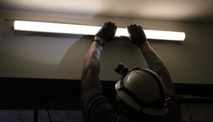 Andre Gale of Centrica installing LED lighting at the African American Museum of Philadelphia