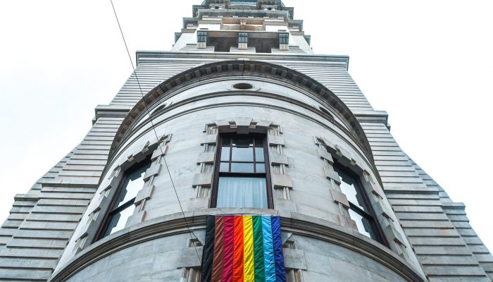 The More Color More Pride flag flies on City Hall