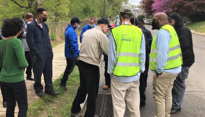 TCB Cleaning Ambassadors gathered in conversation with Drew Brown about the role of storm drains.