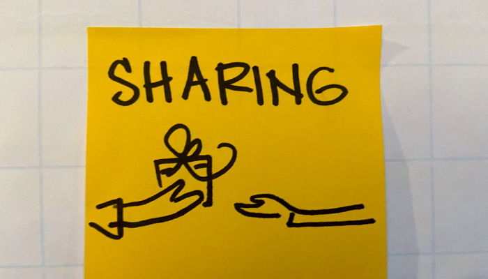 yellow background with black text "sharing"