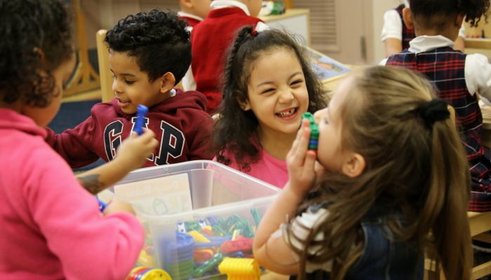 phlprek students at a table smiling