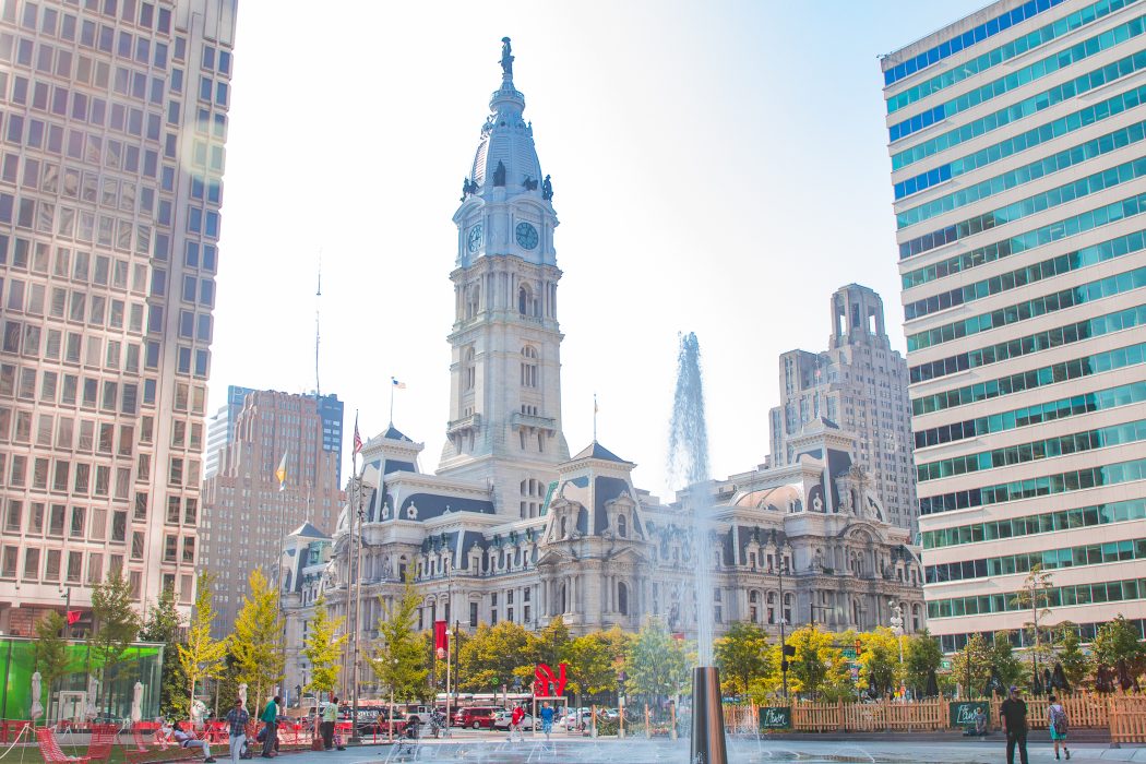 View of City Hall from Love Park during the day.